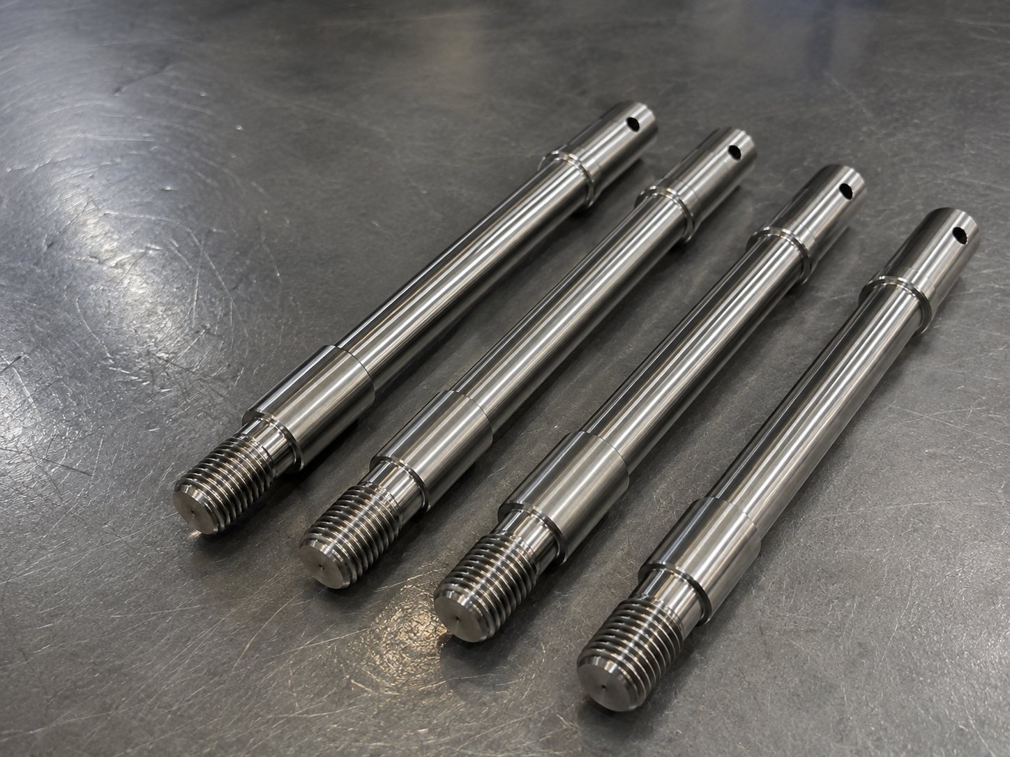 Finished stainless steel CNC turned shafts and threaded parts