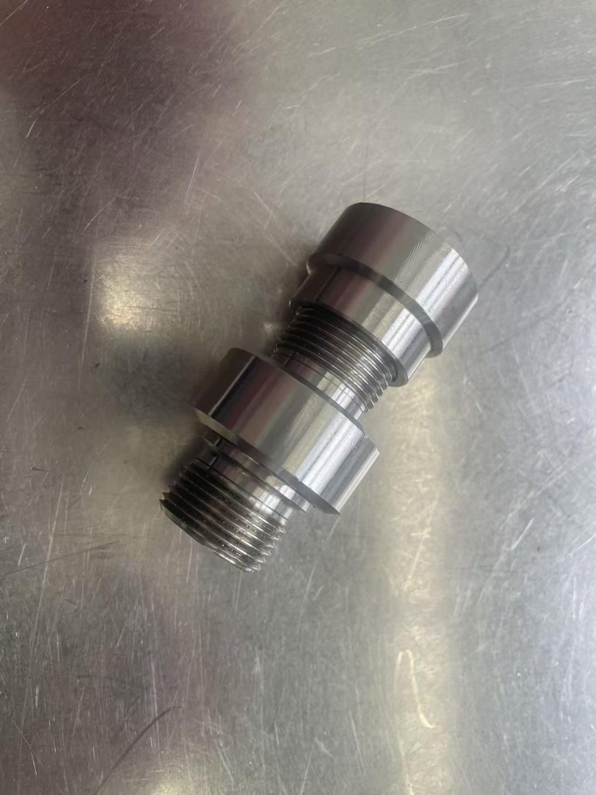 Small custom turned metal part