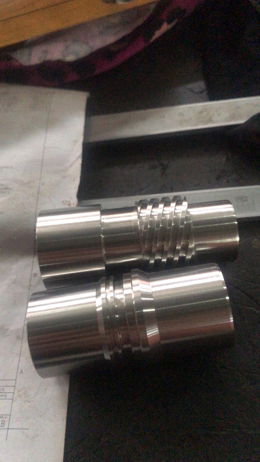 CNC Turned Shafts & Pins Custom turned metal sleeves and threaded parts